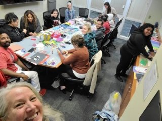 A great group of people gathered to make cards for hospitalized kids!